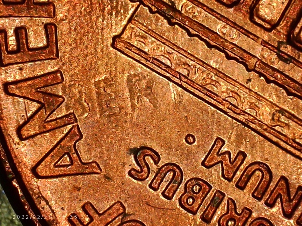 2007 penny flip-over double strike error showing overlapping coin impressions